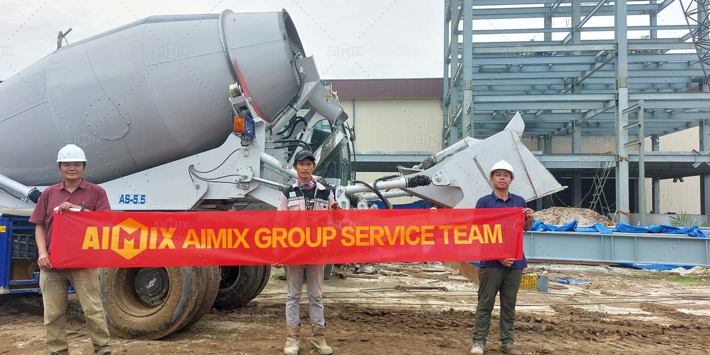 AIMIX and customer with 22m³ per hour self loading mixer for house construction in Medan, Indonesia