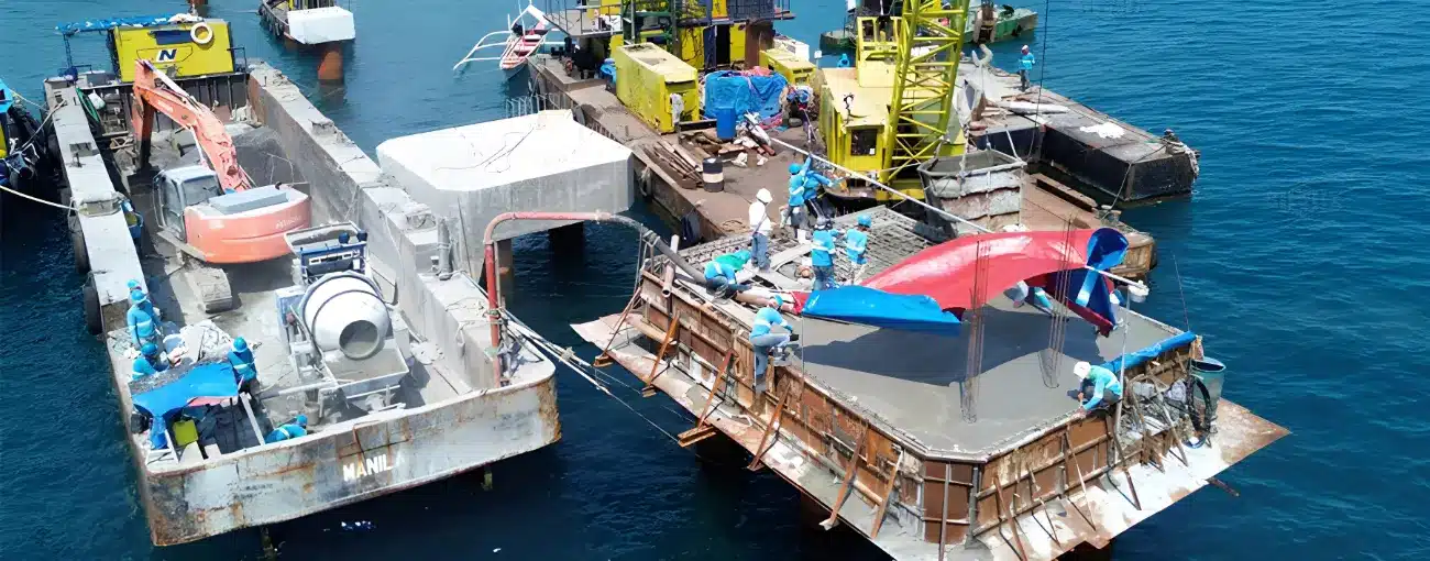 small concrete mixer pump and seaside house building in Indonesia